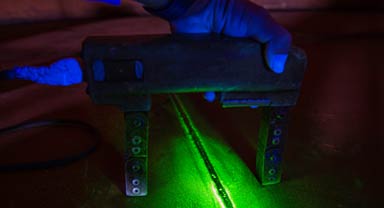 Magnetic and fluorescent particle inspection